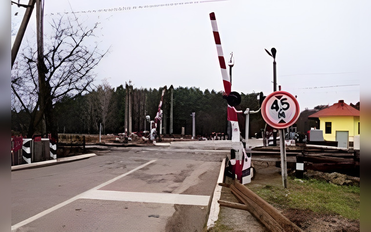 Ілюстрація: У якому випадку Ви можете проїхати під шлагбаумом, який опускається на залізничному переїзді?